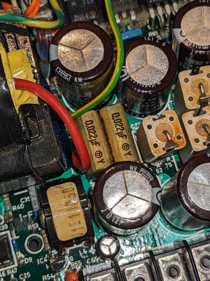 Two more RIFA capacitors in the Cifer power supply, value 0.022 micro farads.